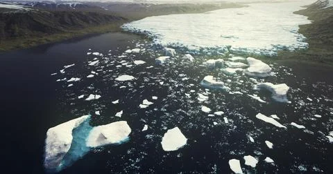 Icebergs floating in a glacial lagoon surrounded by mountains Stock Illustration