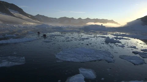 Icebergs in the sunset in the middle of the Arctic Ocean, Greenland Video stock 103510968