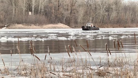Icebreaker breaks a path in the ice Stock Footage 74245008