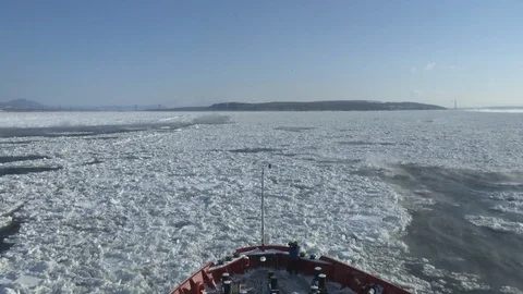 Icebreaker going through the ice fields Stock Footage 99079259