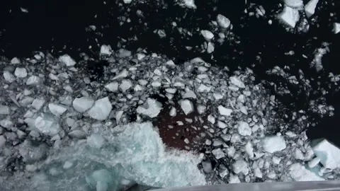 Icebreaker ship bow through pack ice Antarctica, 4K Stock Footage 332399063