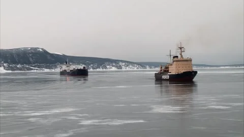 Icebreakers operating in frozen waters Stock Footage 313543416