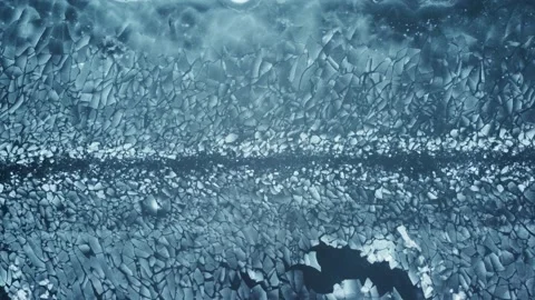 The icebreaker’s way through cracked thin ice on the river Stock Footage 226915513