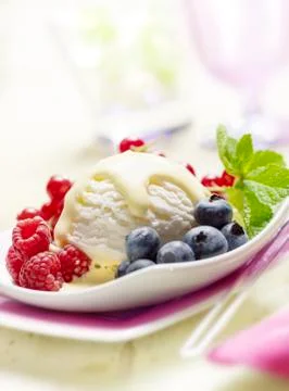 Icecream with fruit Stock Photos