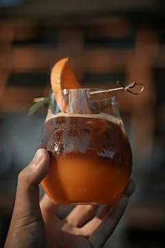Iced americano black coffee and layer of orange . Stock Photos