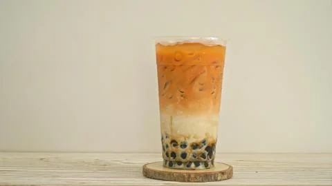 Iced bubble tea with tapioca pearls in a tall glass Stock Photos
