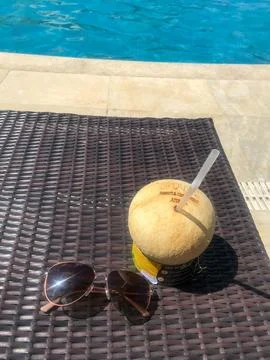Iced coconut by the pool Stock-Fotos
