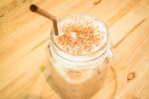 Iced cofee mocha drink serving on wooden table Stock-Fotos