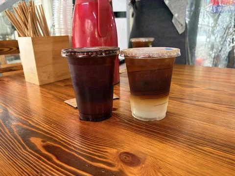 Iced Coffee and Cold Brew on Wooden Cafe? Table Фото