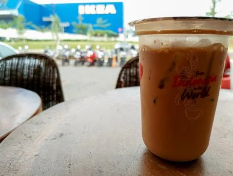 Iced Coffee Break: A Refreshing Moment in the City Stock Photos