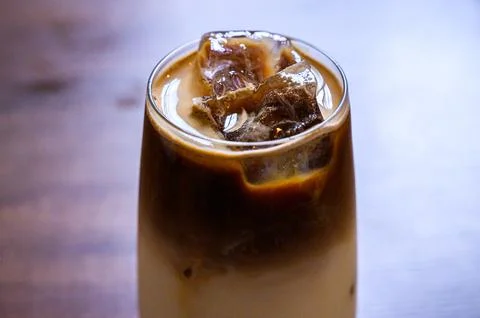 Iced coffee cold brew drink with melting ice Stock Photos