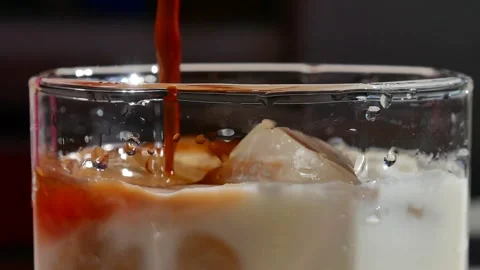 Iced Coffee with Milk Closeup. Stock Footage 156936330