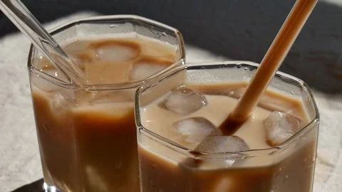Iced Coffee with Milk Closeup. Stock Footage 156936615