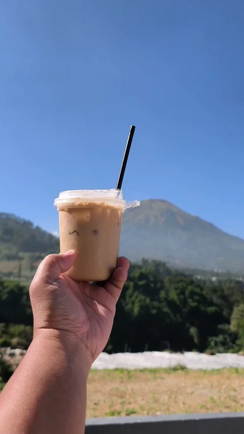 Iced Coffee with Mountain View 스톡 동영상 340151865