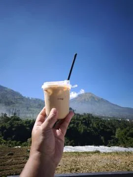 Iced Coffee with Mountain View Stock Photos