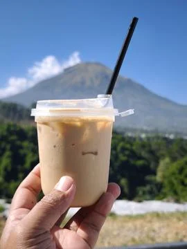 Iced Coffee with Mountain View Stock Photos