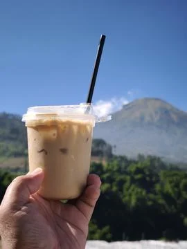 Iced Coffee with Mountain View Stock Photos