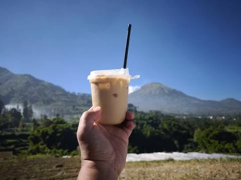 Iced Coffee with Mountain View Stock Photos