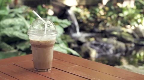 Iced Coffee Outdoors, Clear Spring Water Stock Footage 66295099