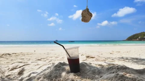 Iced Coffee in plastic disposable cup at shore. 動画素材 274120041