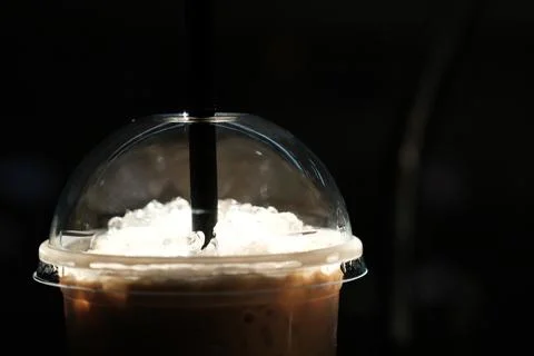 Iced coffee in a plastic mug Stock Photos