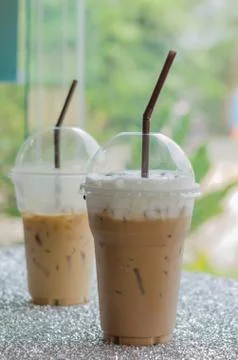 Iced coffee with straw Stock-Fotos