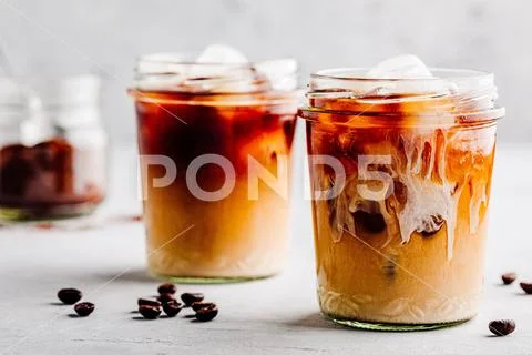 Iced Coffee with Vanilla Cardamom Almond Milk Stock Photos