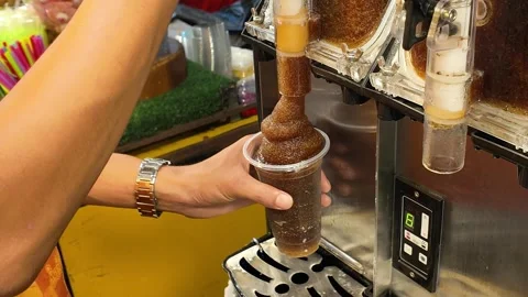 Iced Cola Soft Drink Dispensed from Machine at Thai Street Market 4K Stock Footage 332636041