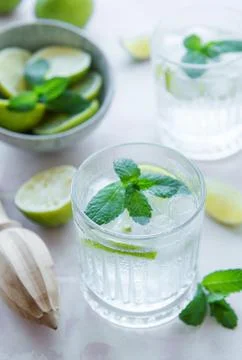 Iced cold lemonade with fresh lime and juice Stock Photos