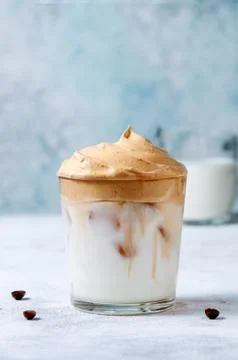 Iced Dalgona Coffee on Ligrht Background. Trendy Creamy Whipped Coffee. South Stock Photos