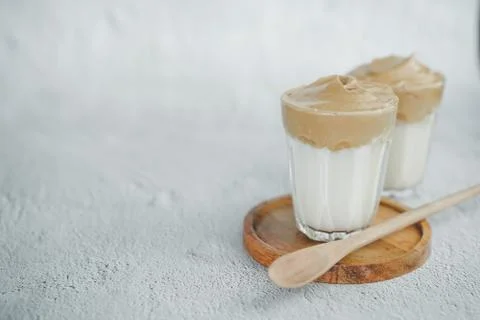 Iced Dalgona Coffee, a trendy fluffy creamy whipped coffee. Summer iced coffe Stock Photos