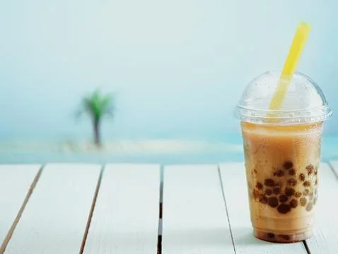 Iced drink in a covered cup Stock Photos