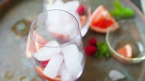 Iced grapefruit raspberry drink Stock Footage 77194271