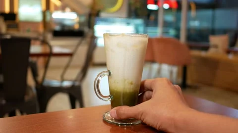 Iced green tea late at cafe Stock Footage 205597932