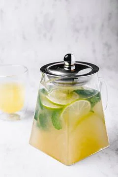 Iced green tea with lime and fresh mint Stock Photos