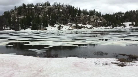 Iced lake in Yellowstone Stock Footage 202185320