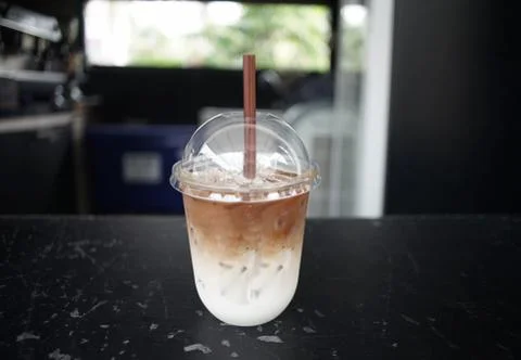 Iced Latte coffee in a cup at a shop Stock Photos