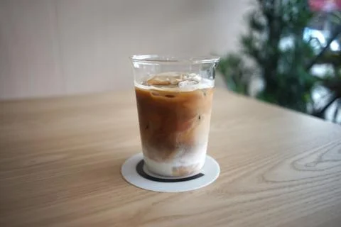Iced Latte coffee in a grass Stock Photos