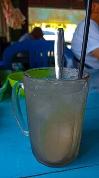 Iced lime drinking Stock Photos