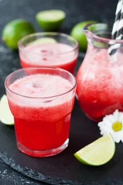 Iced limeade with berries Stock Photos