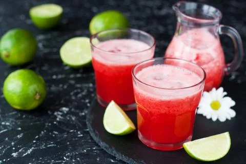 Iced limeade with berries Stock Photos