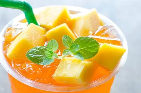 Iced mango tea lemonade Stock Photos