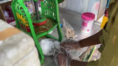 Iced Popsicle Making With Hands. Indian Ice Gola. 4K Stock Footage 240300887