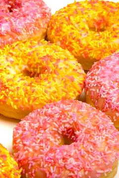 Iced Ring Donuts On A White Background Stock Photos