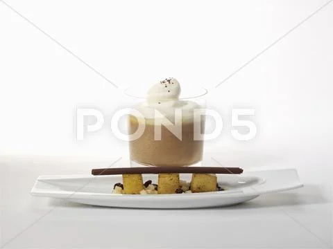 Iced Rüdesheim coffee with salt butter-glazed quinces Stock Photos