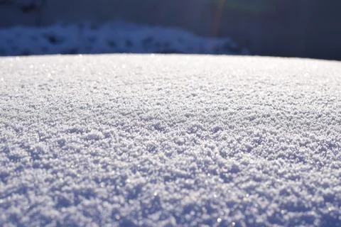 Iced snow in the sunlight as a close up Stock Photos