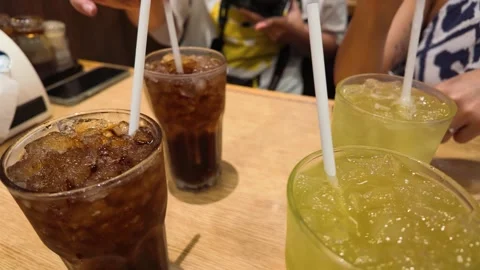 Iced Tea and Soda Beverages on Restaurant Table Stock Footage 340245239