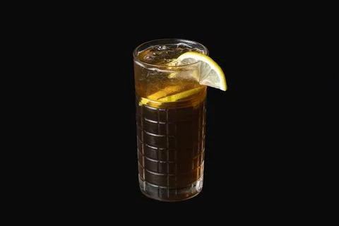 Iced Tea with Lemon Slice on Black Background Stock Photos