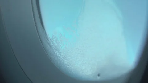 Iced window on an airplane 動画素材 84066507