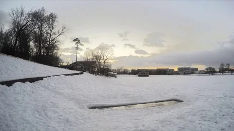 Icehole On Pond In Winter Evening Timelapse 스톡 동영상 82053380